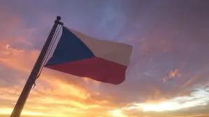 Czech Republic Flag on Flagpole by Evening Sunset Sky