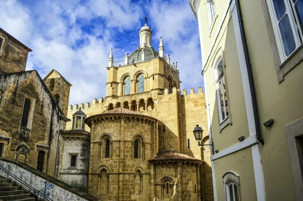 Exterior view of the old Romanesque cathedral, Coimbra, Portugal.