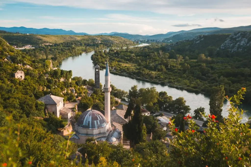 Sisman Ibrahim-immersed Mosque near forested areas and a river in Pocitelj, Bosnia and Herzegovina