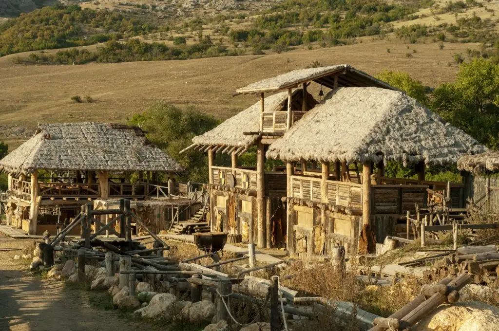 Small little village with Viking houses on the coast of a lake