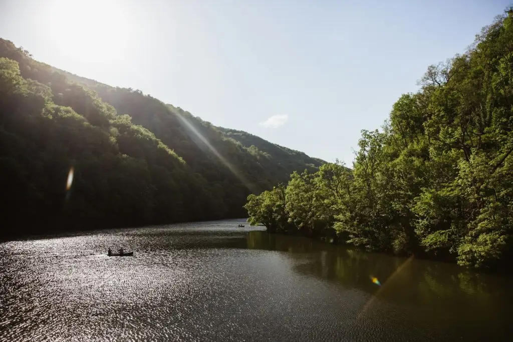 The Green Lake of Hamori in Lillafure near Miskolc, Hungary. Spring landscape with sunrays covering