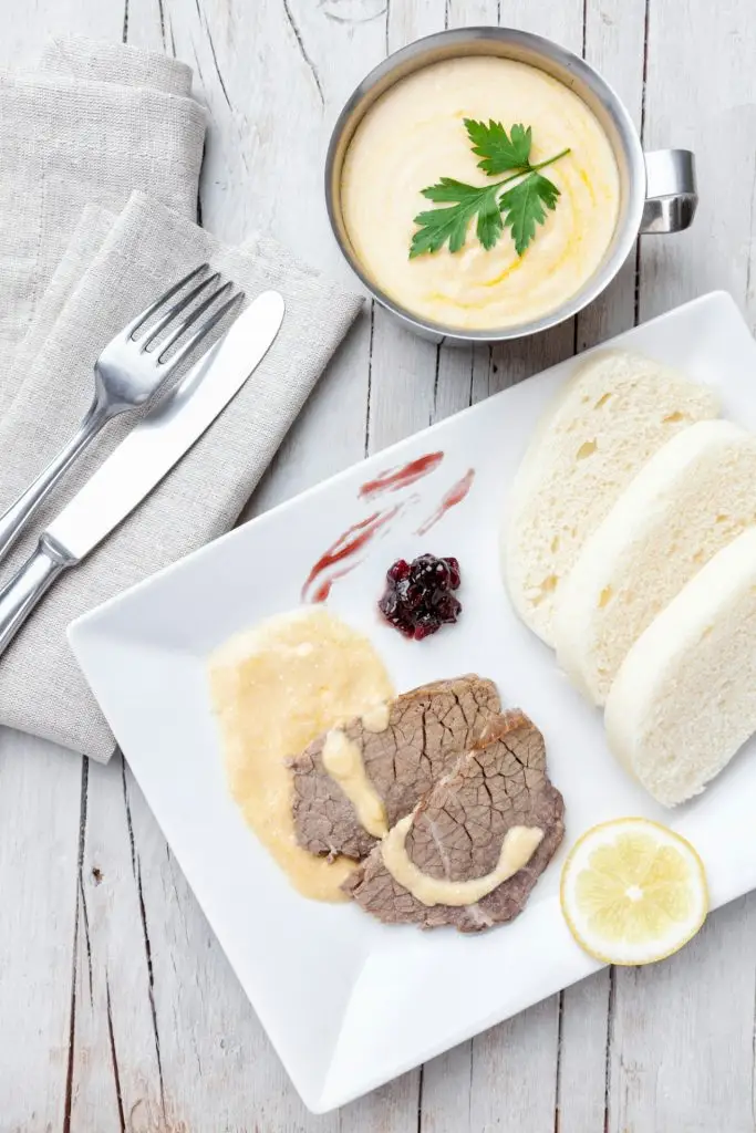 Traditional Czech and Slovak sirloin with cream sauce and dumplings