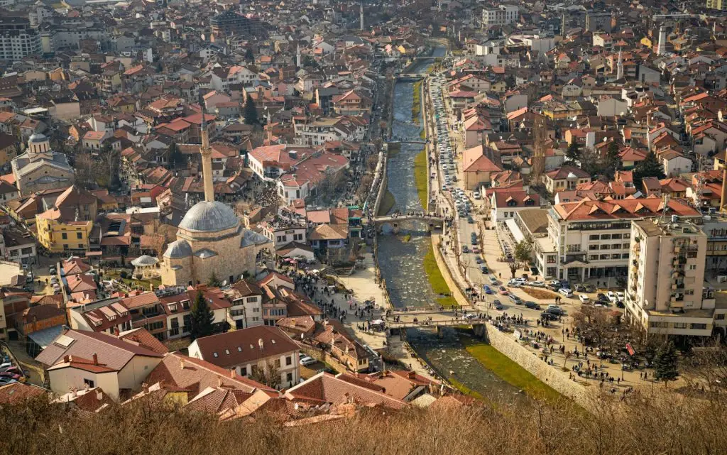 Aerial view of the cityscape of Prizren, Kosovo with mosques on a sunny day