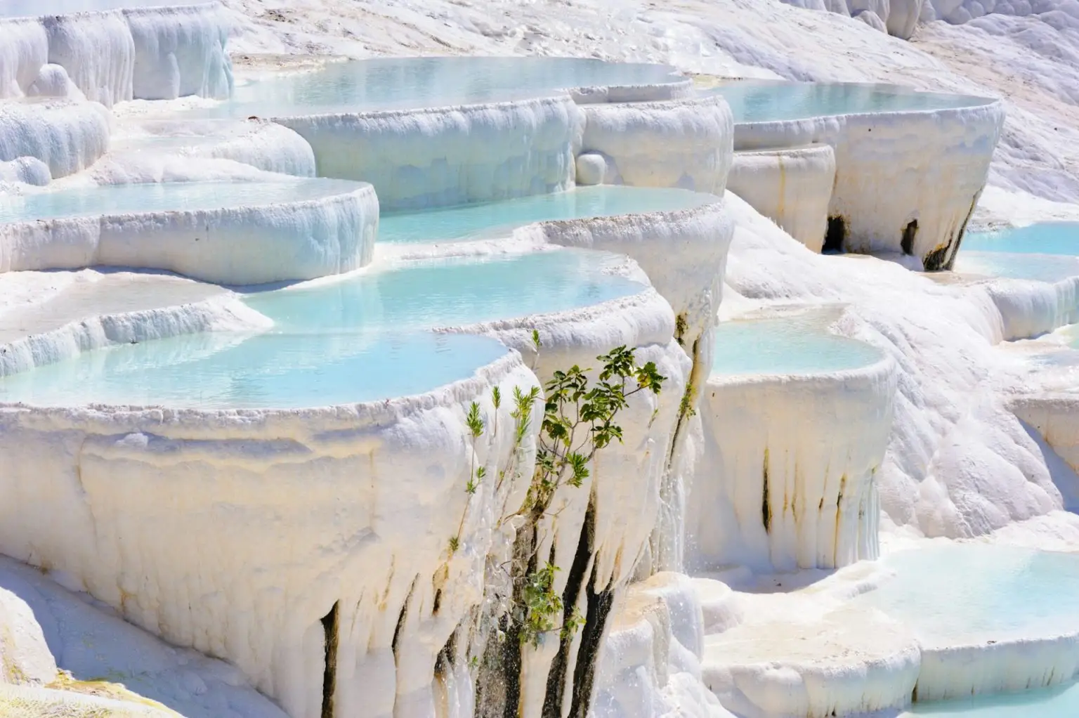 Blue water travertine pools at Pamukkale, Turkey
