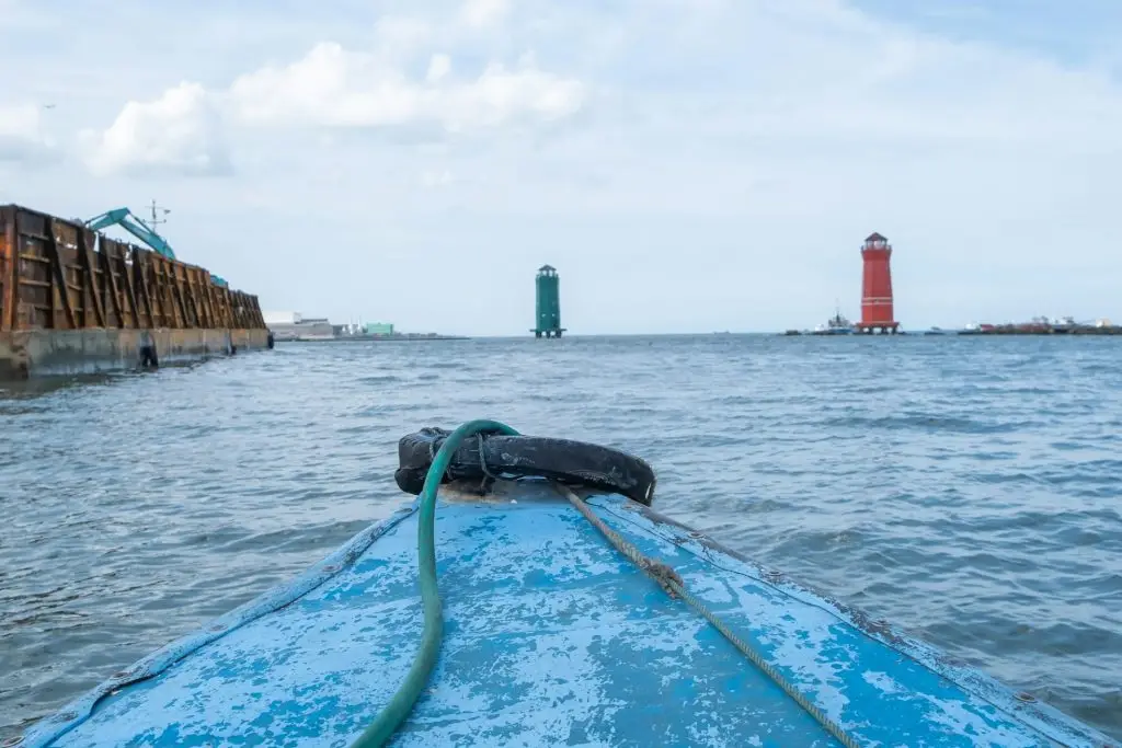 Boating with small wooden ship along in Sunda Kelapa Port, Jakarta for the vacation leisure