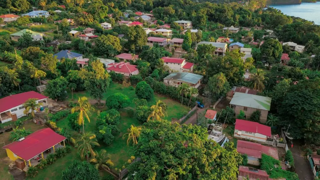 Colorful Houses among the green trees on the Guadalupe hills