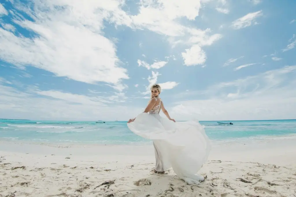 Wideangle shot of a bride on a paradise island in Dominican Republic