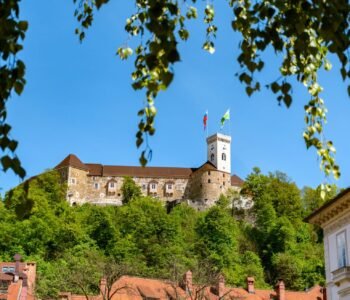 Low angle view of Ljubljana castle on a sunny day in spring or summer.